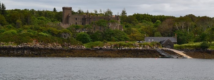 A castle view from across a body of water