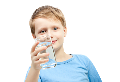 Boy holding a glass of water