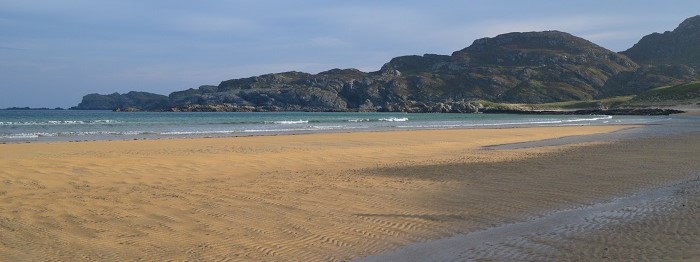 Beach with hills in the background