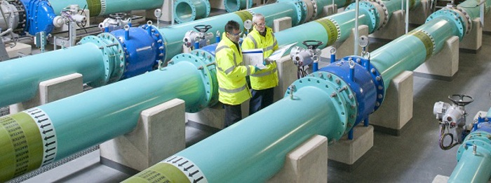 Staff inspecting pipework