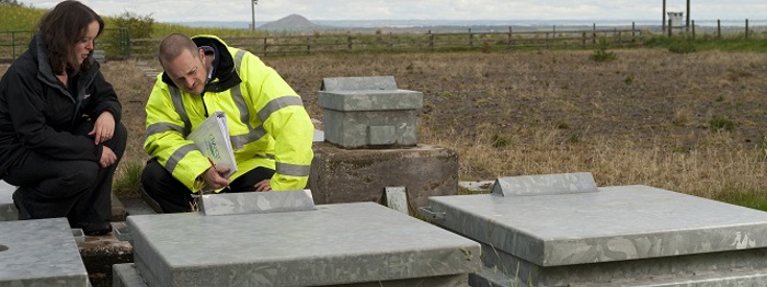 DWQR staff member inspecting a service reservoir